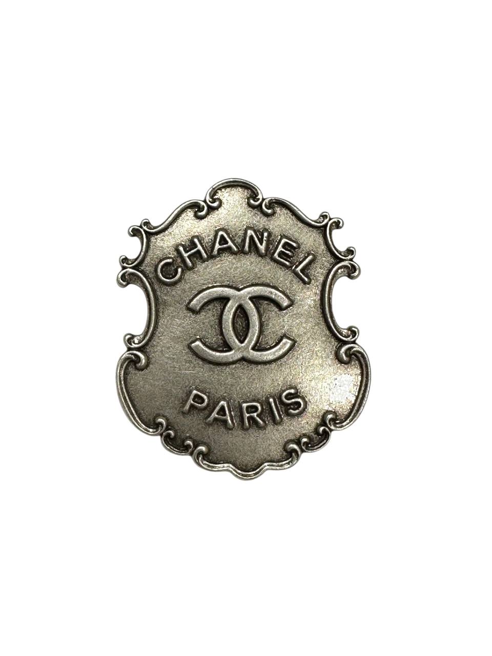 Chanel металева брошь з логотипом cc